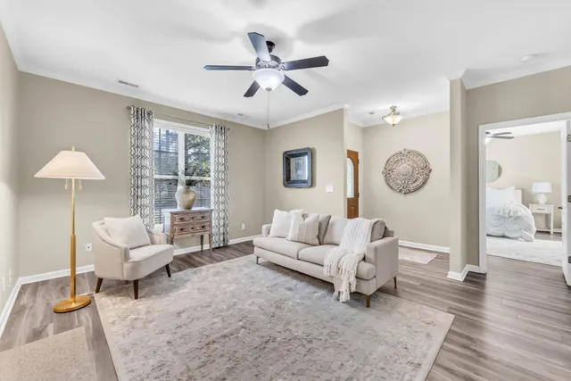 a living room with furniture and a window
