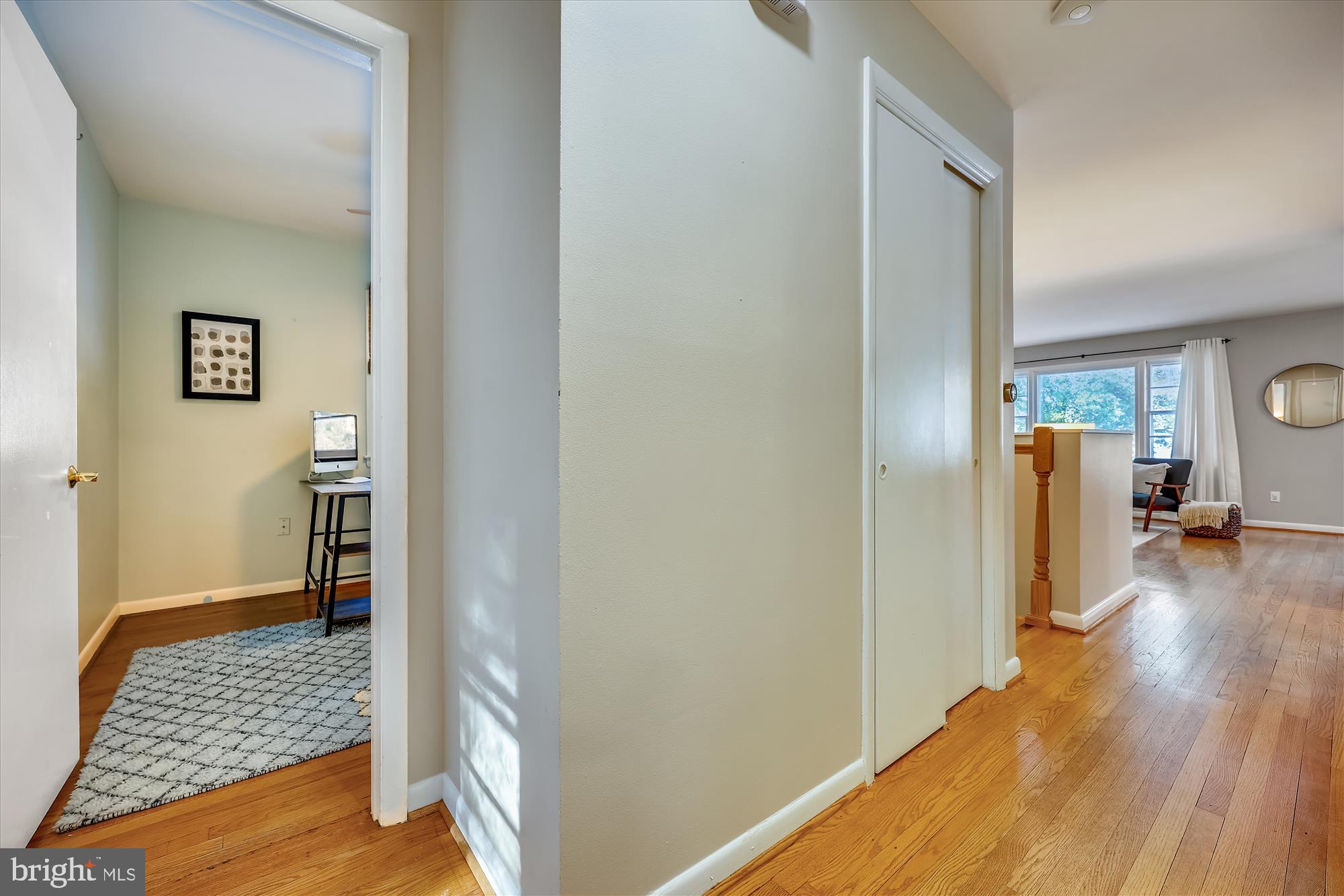 11310 Mapleview Drive Silver Spring, MD 20902 - Photo 13 of 40 a view of room with window and wooden floor