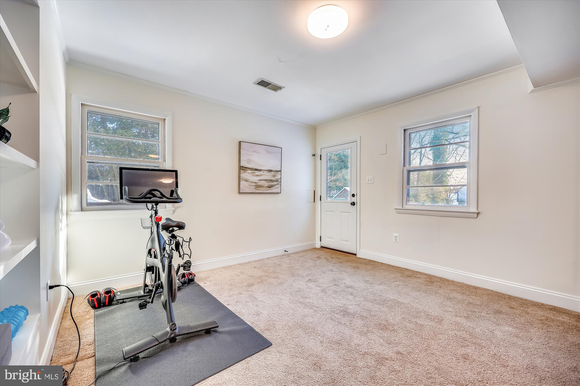 11310 Mapleview Drive Silver Spring, MD 20902 - Photo 28 of 40 a view of a room with gym equipment