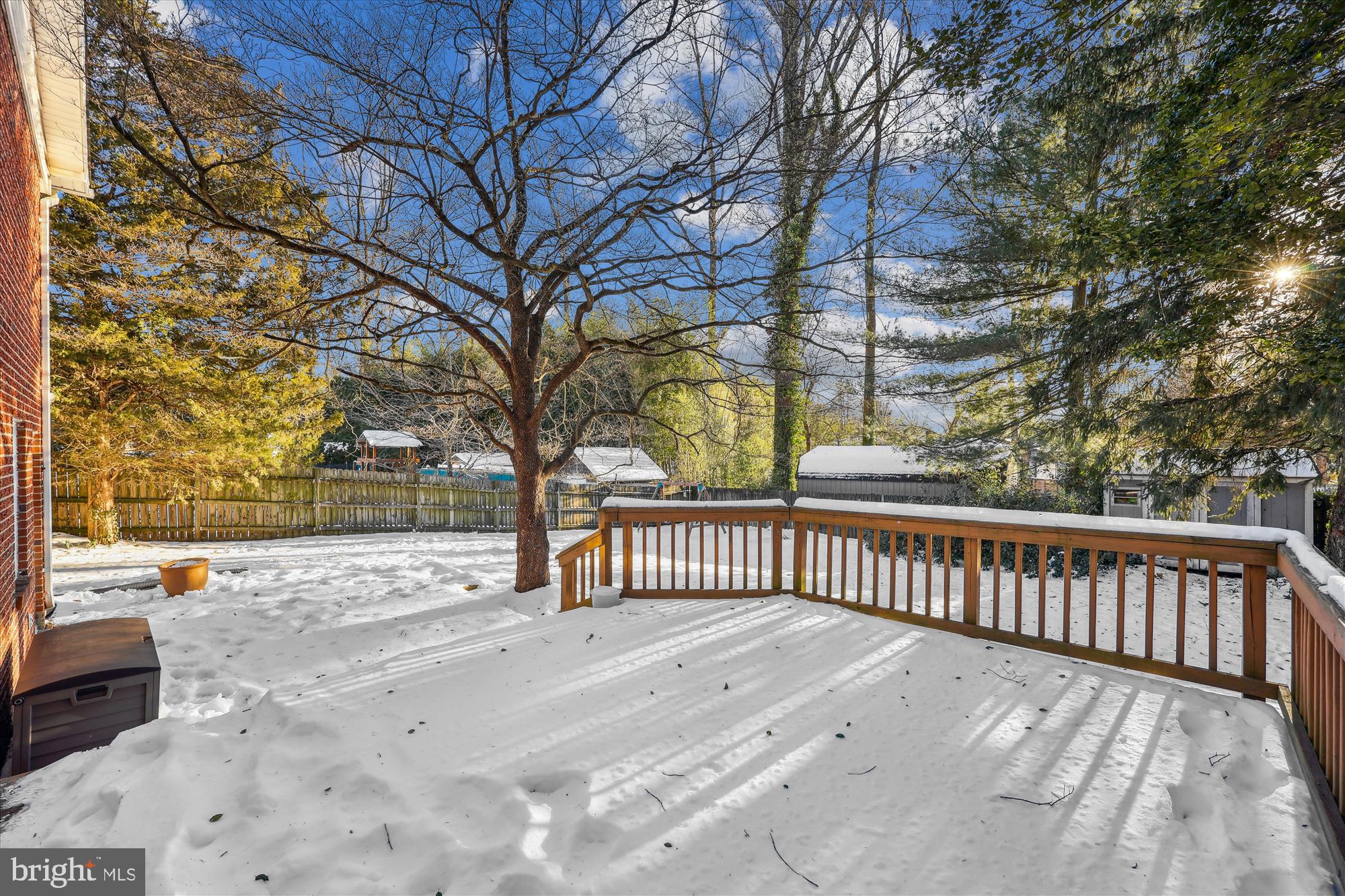 11310 Mapleview Drive Silver Spring, MD 20902 - Photo 34 of 40 a view of backyard with a deck and wooden floor