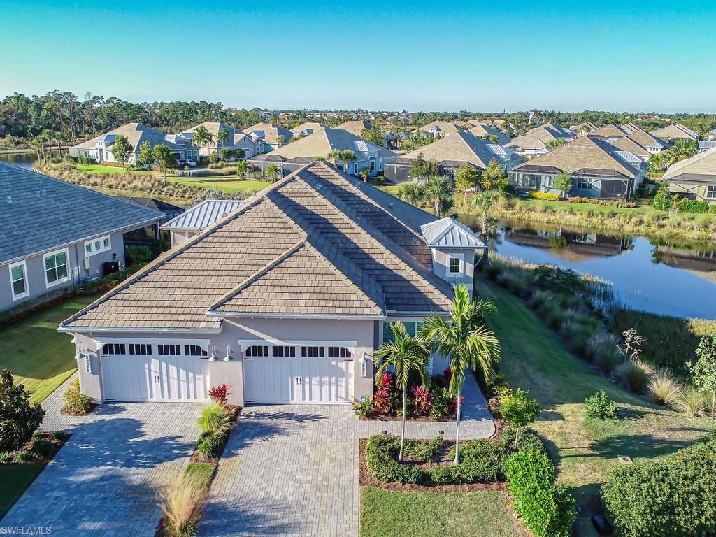 7002 Dominica Drive Naples, FL 34113 - Photo 1 of 33 an aerial view of multiple house