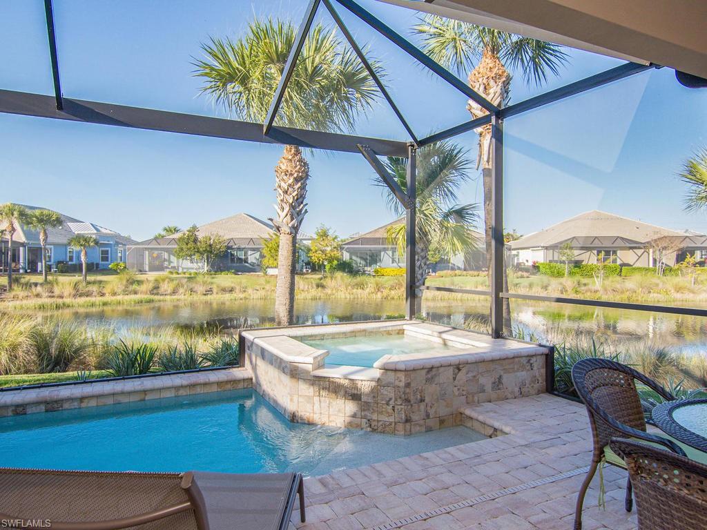 7002 Dominica Drive Naples, FL 34113 - Photo 15 of 33 a view of outdoor space with swimming pool and furniture