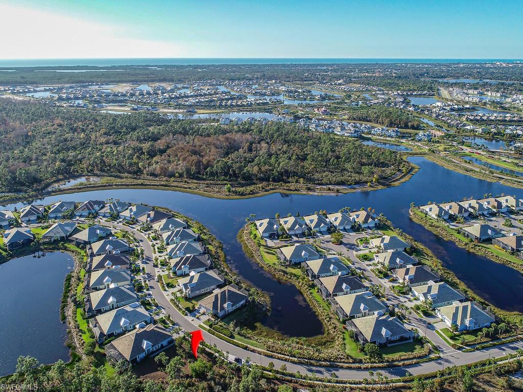 7002 Dominica Drive Naples, FL 34113 - Photo 18 of 33 an aerial view of a and an outdoor space