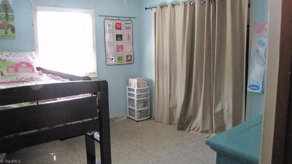 3963 Lewiston Road Summerfield, NC 27358 - Photo 16 of 22 Third Bedroom