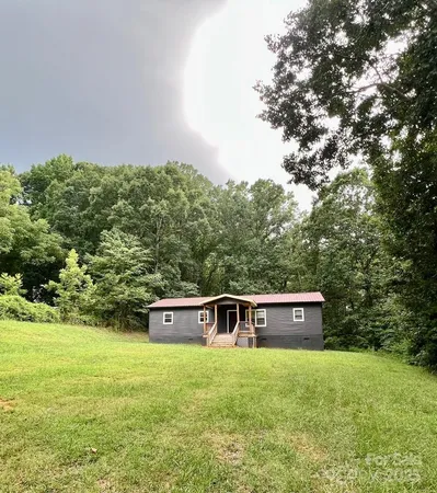 a fire hydrant in the middle of a field