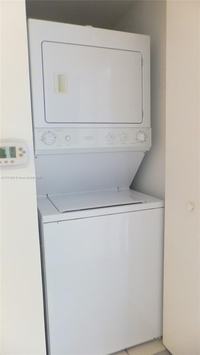 2775 Northeast 187th Street, Unit 329 Aventura, FL 33180 - Photo 11 of 21 a close up view of washer and dryer