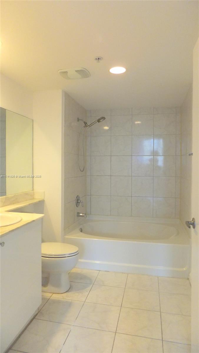 2775 Northeast 187th Street, Unit 329 Aventura, FL 33180 - Photo 5 of 21 a bathroom with a bathtub shower sink vanity and toilet