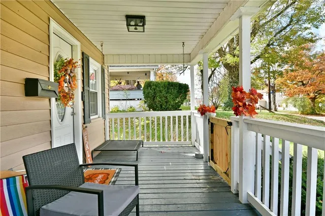 a view of a porch with furniture