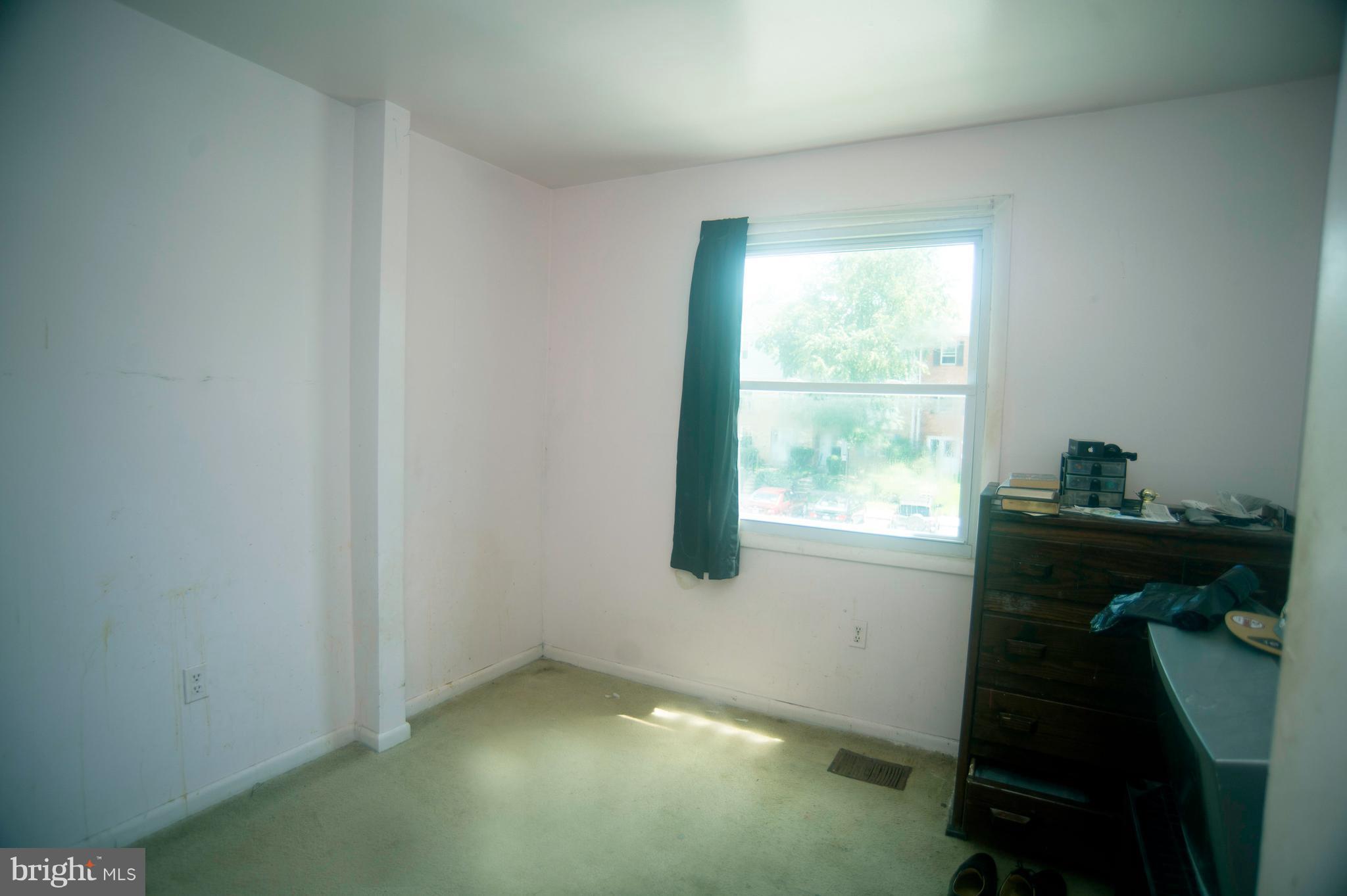 52 Timber Rock Road Gaithersburg, MD 20878 - Photo 20 of 30 a view of an empty room and window