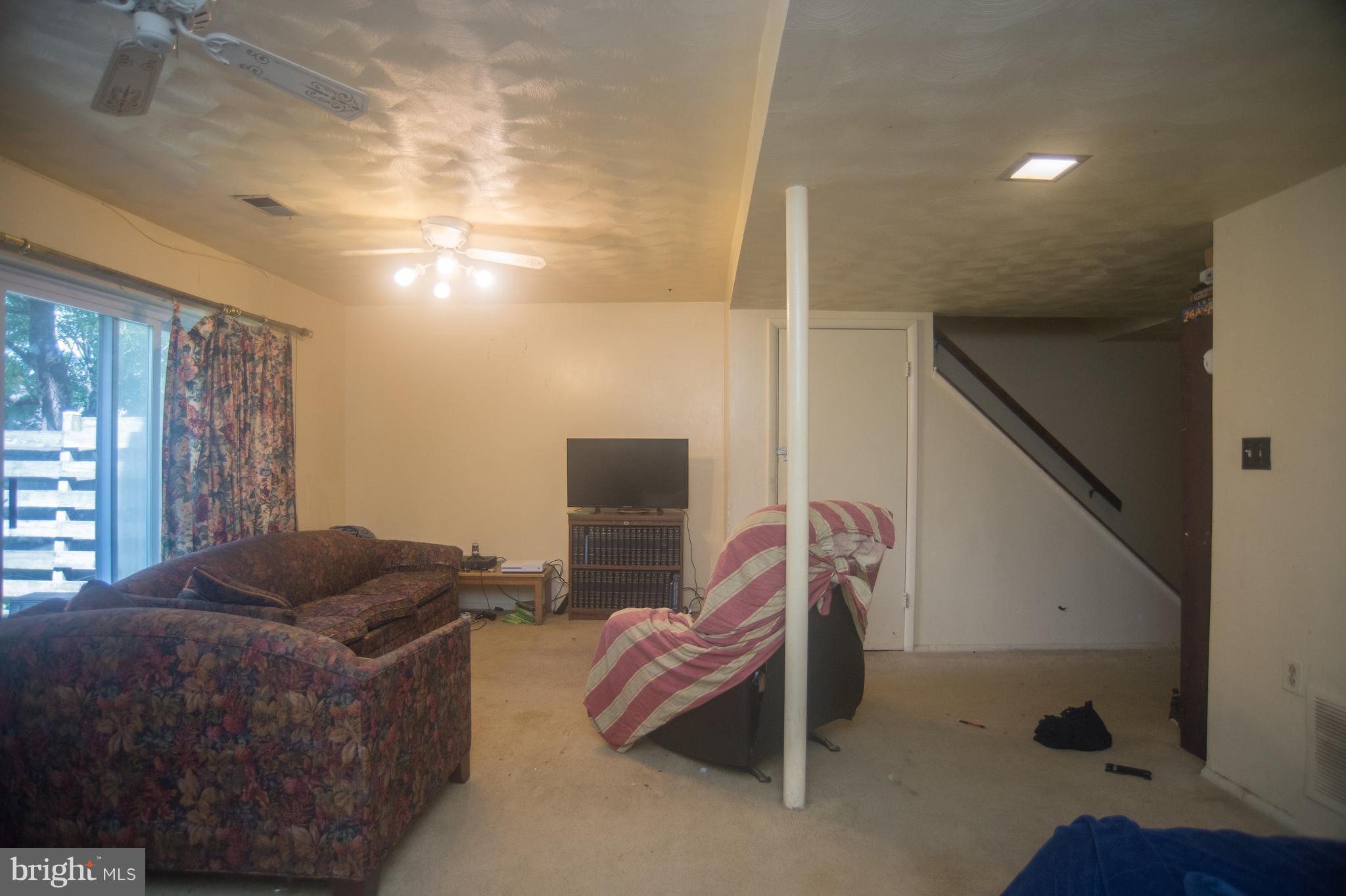 52 Timber Rock Road Gaithersburg, MD 20878 - Photo 23 of 30 a living room with furniture and a window