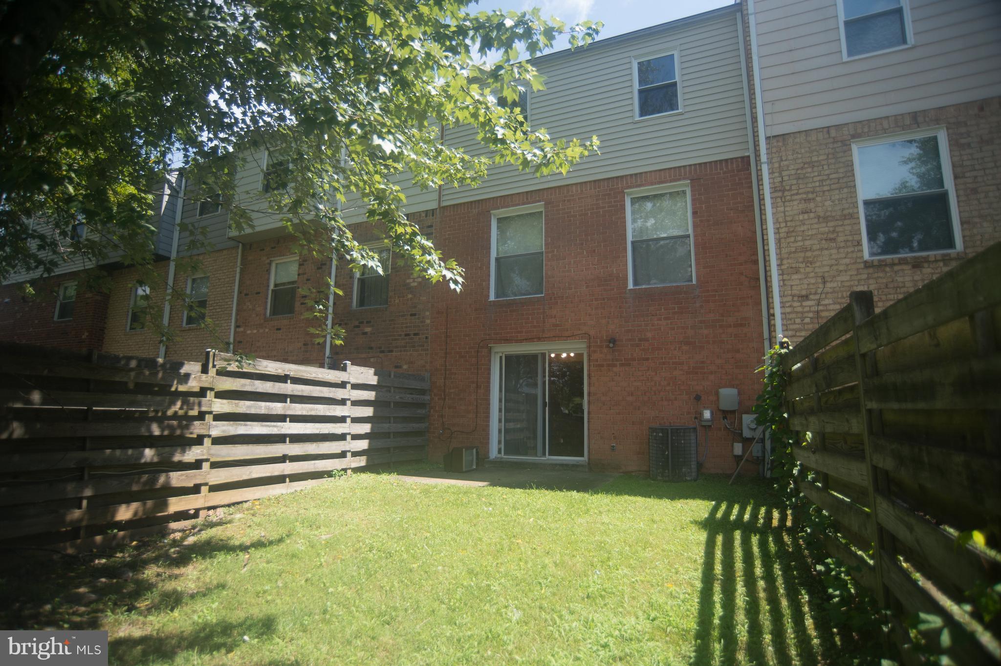 52 Timber Rock Road Gaithersburg, MD 20878 - Photo 27 of 30 a view of a house with a yard
