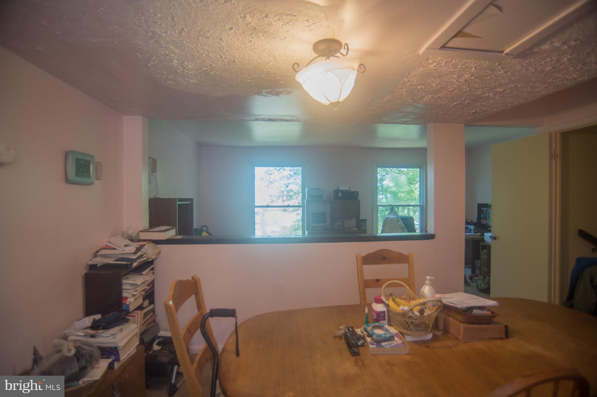 52 Timber Rock Road Gaithersburg, MD 20878 - Photo 7 of 30 a view of a dining room with furniture