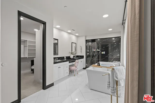 a kitchen with a white stove next to a window