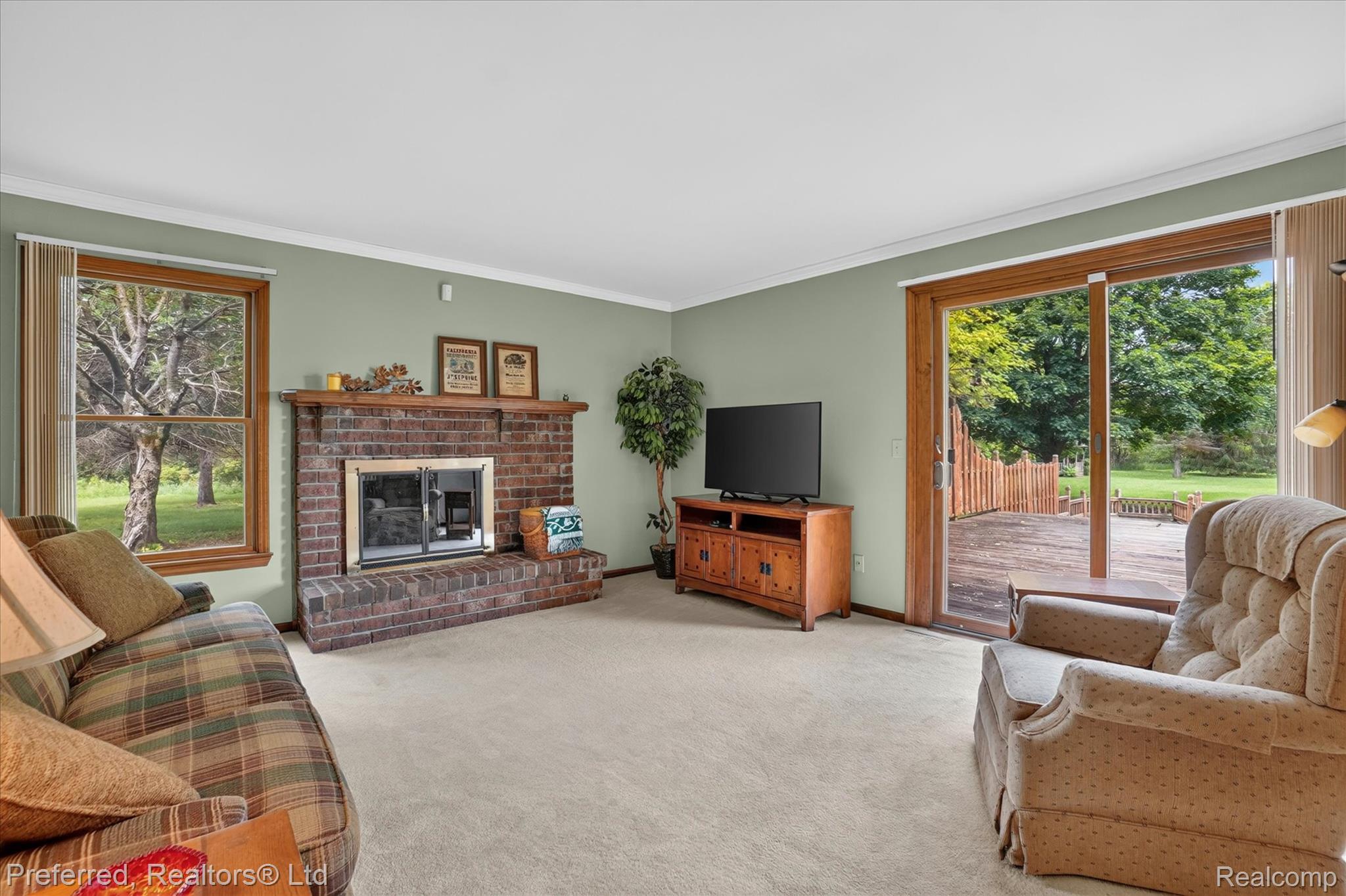 9065 East Richfield Road Davison, MI 48423 - Photo 18 of 75 Living area featuring a gas fireplace