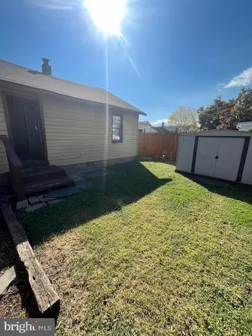 a view of backyard with hardwood