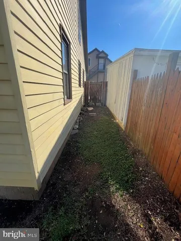 a view of a back yard of the house