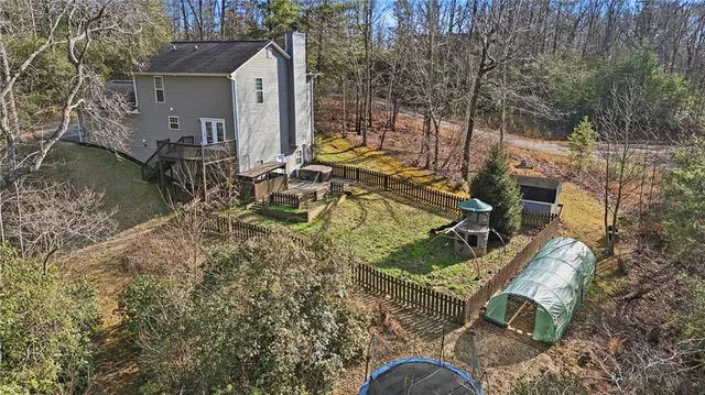 a view of an empty room with a fireplace