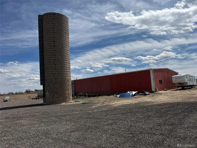 a view of parking garage with cars
