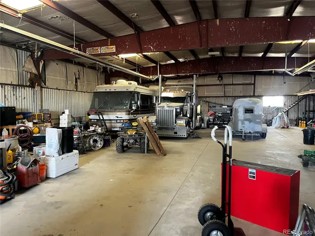 a view of room with wooden floor