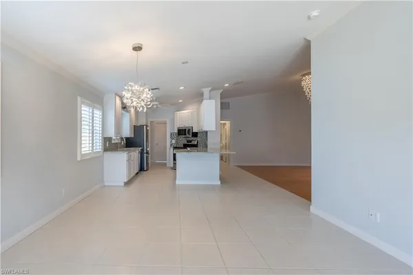 a view of kitchen and chandelier