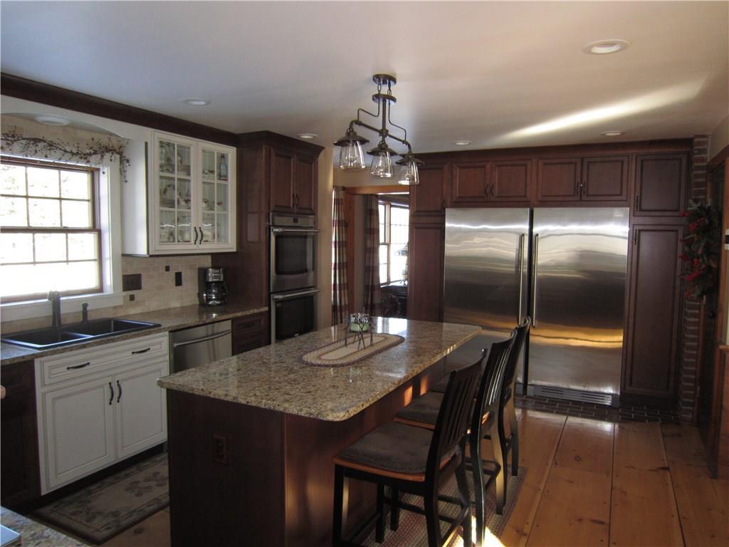 74 Hughes Road Mapleton, ME 04757 - Photo 11 of 33 Door to the left of photo leads to...