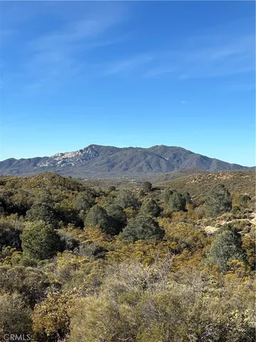 a view of a houses with mountain view
