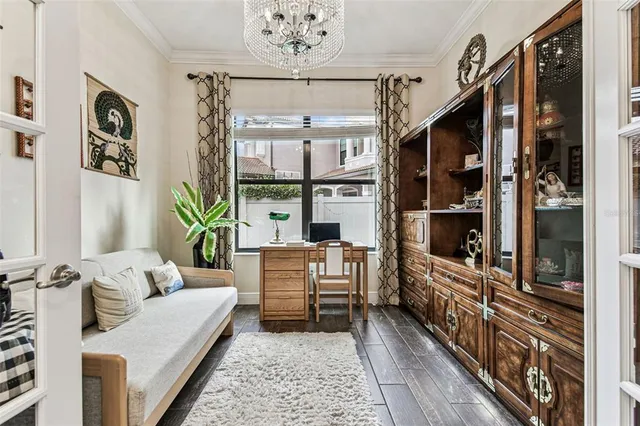 a bathroom with a granite countertop sink and a toilet