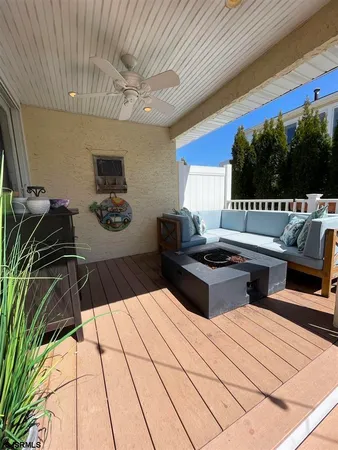 a living room with a couch and a flat screen tv