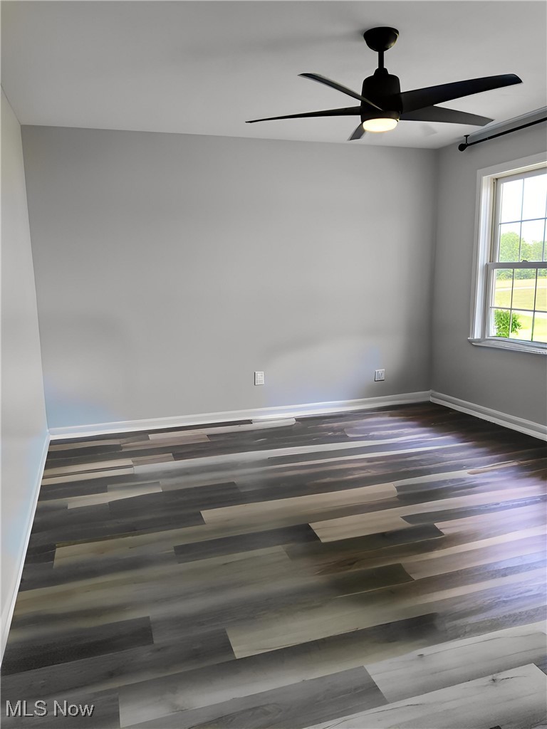9415 Stone Road Litchfield, OH 44253 - Photo 12 of 28 Unfurnished room featuring ceiling fan/light, new hardware.