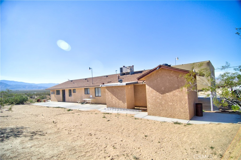 51063 Joshua Tree Road Landers, CA 92285 - Photo 17 of 38 This shows most of the immediate backyard