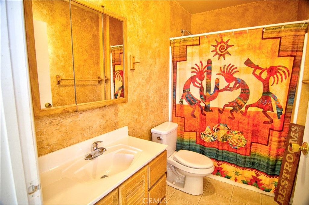 51063 Joshua Tree Road Landers, CA 92285 - Photo 26 of 38 The light in this photo is blown out, but this is the 2nd. bathroom. It's in the garage and could easily be made a part of a third bedroom