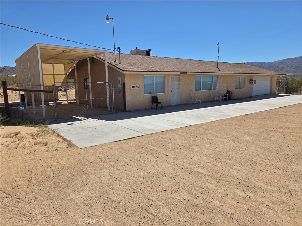 51063 Joshua Tree Road Landers, CA 92285 - Photo 3 of 38 RV shade parking