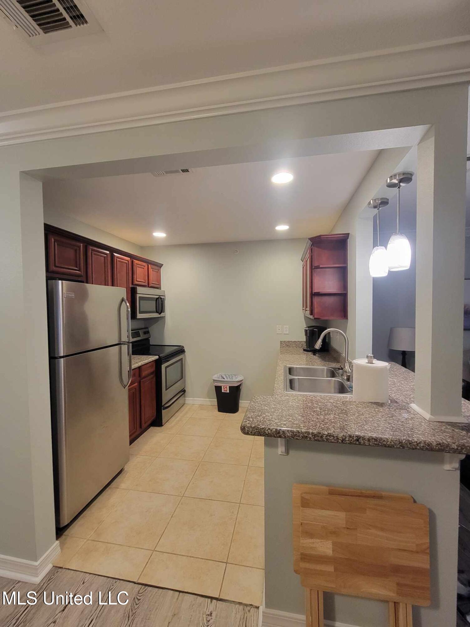 1282 Beach Boulevard, Unit 209 Biloxi, MS 39530 - Photo 8 of 8 487927488_979082404409273_55439885263247