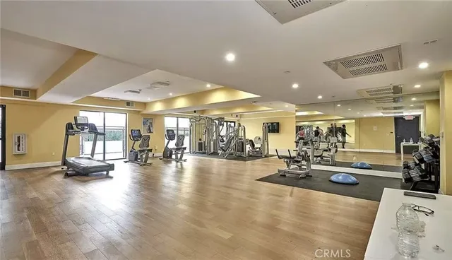 a view of a balcony with furniture