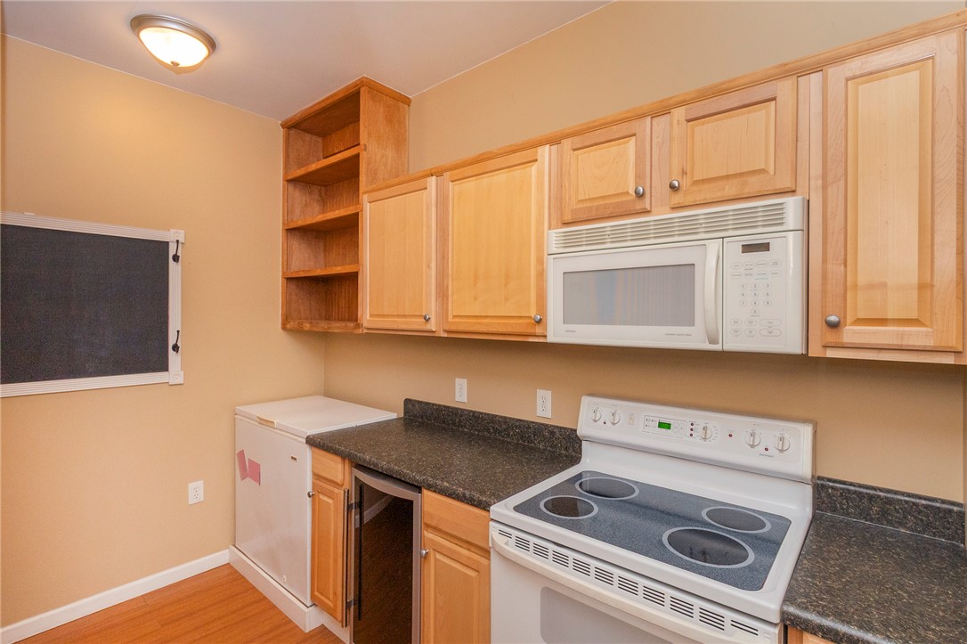 125 Inlet Pointe Drive Anderson, SC 29625 - Photo 14 of 39 pantry with ample cabinetry and essential appliances for everyday living.