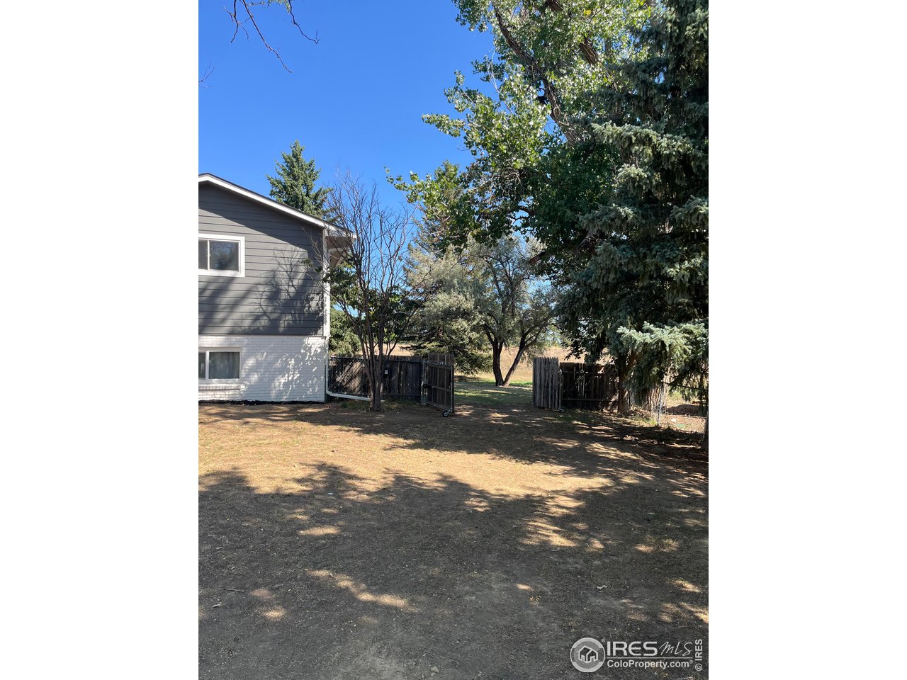 1200 Gregory Road Fort Collins, CO 80524 - Photo 35 of 40 Backyard with RV/Boat Parking