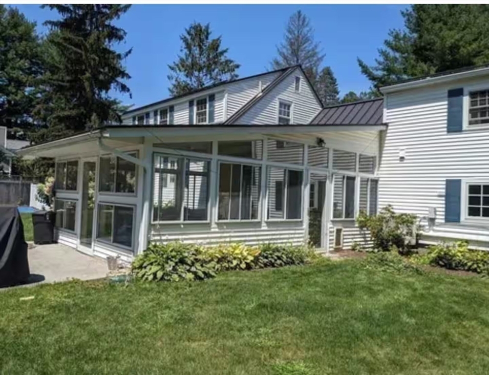 161 Chestnut Street Amherst, MA 01002 - Photo 18 of 41 a front view of a house with a garden