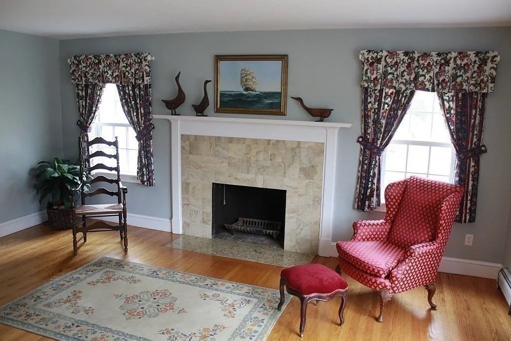 161 Chestnut Street Amherst, MA 01002 - Photo 29 of 41 a living room with furniture a window and a fireplace