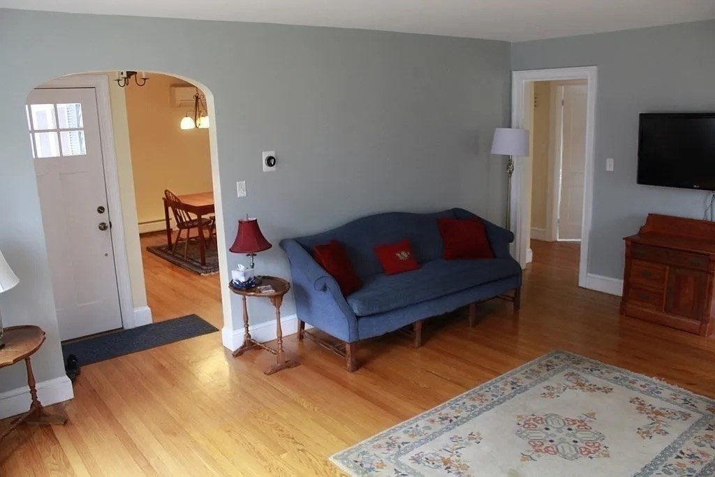 161 Chestnut Street Amherst, MA 01002 - Photo 31 of 41 a living room with furniture and a flat screen tv