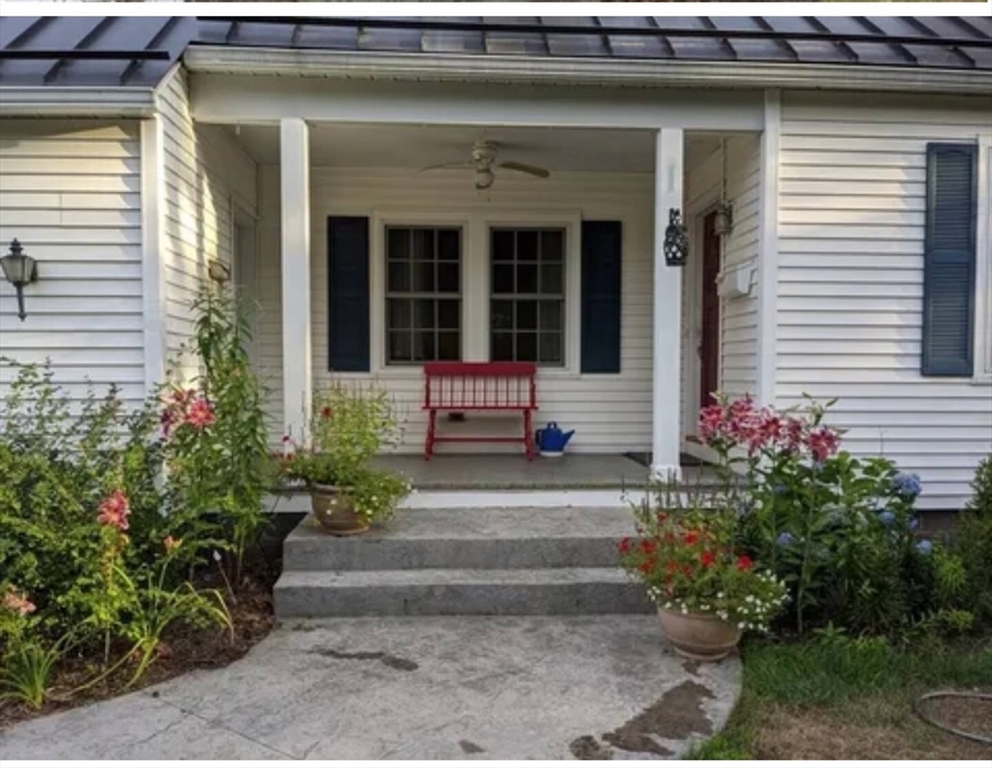 161 Chestnut Street Amherst, MA 01002 - Photo 34 of 41 a front view of a house with a garden