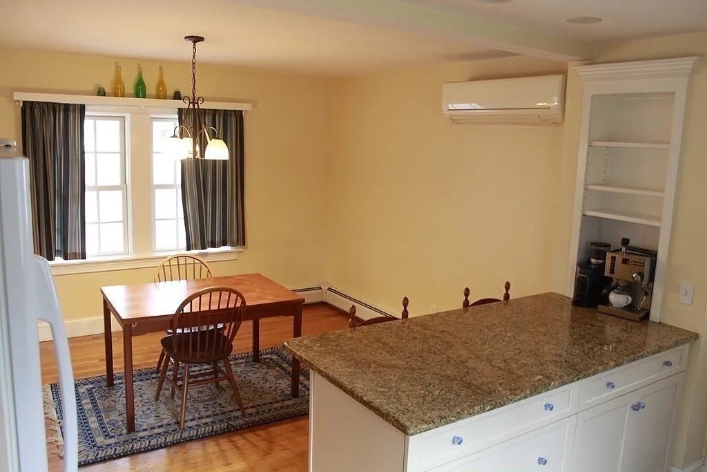 161 Chestnut Street Amherst, MA 01002 - Photo 40 of 41 a kitchen with a table and chairs