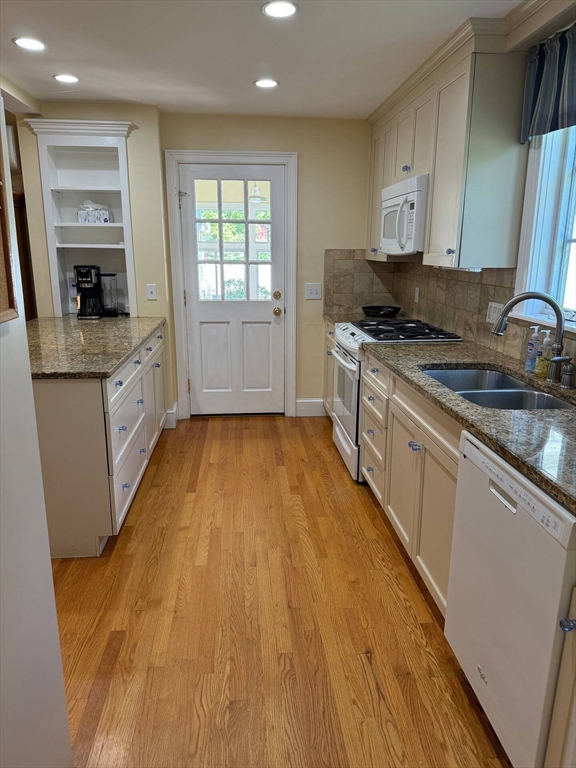 161 Chestnut Street Amherst, MA 01002 - Photo 5 of 41 a large kitchen with stainless steel appliances granite countertop a stove a sink and a granite counter tops