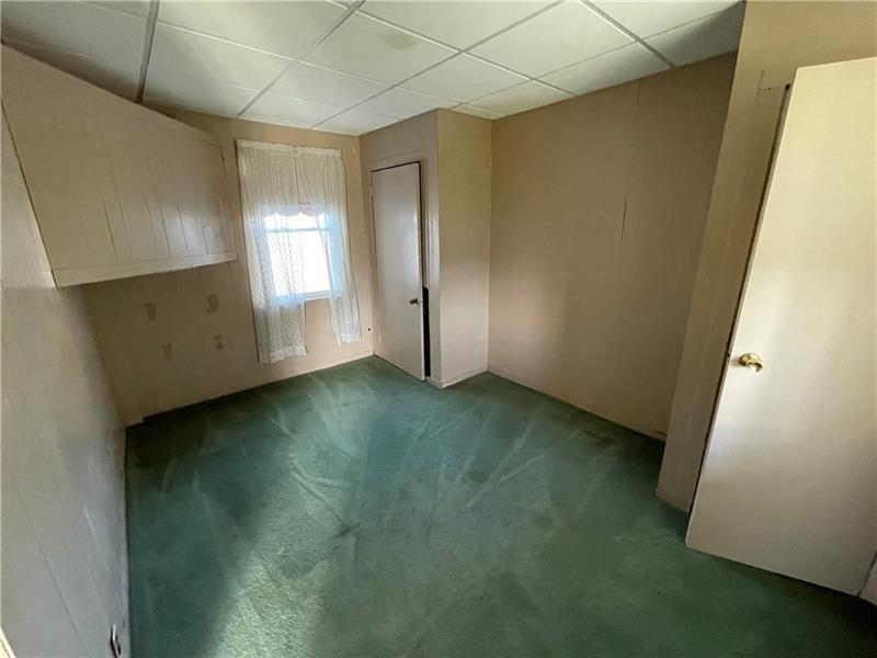 211 South Walnut Street New Castle, PA 16101 - Photo 18 of 18 an empty room with a window