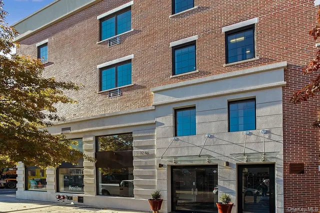 a front view of a building with street