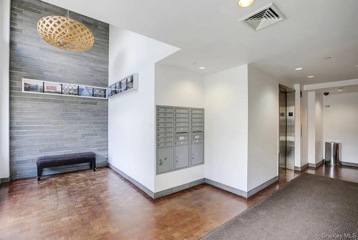 32-86 41st Street, Unit 3F Queens, NY 11103 - Photo 8 of 9 a view of entryway with stairs