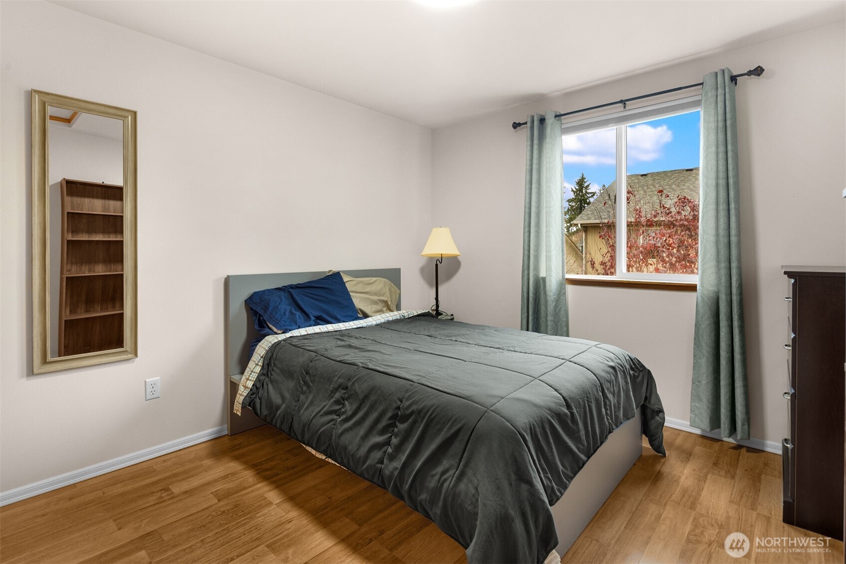 2632 Northeast 24th Court Renton, WA 98056 - Photo 15 of 33 a bedroom with a bed and window