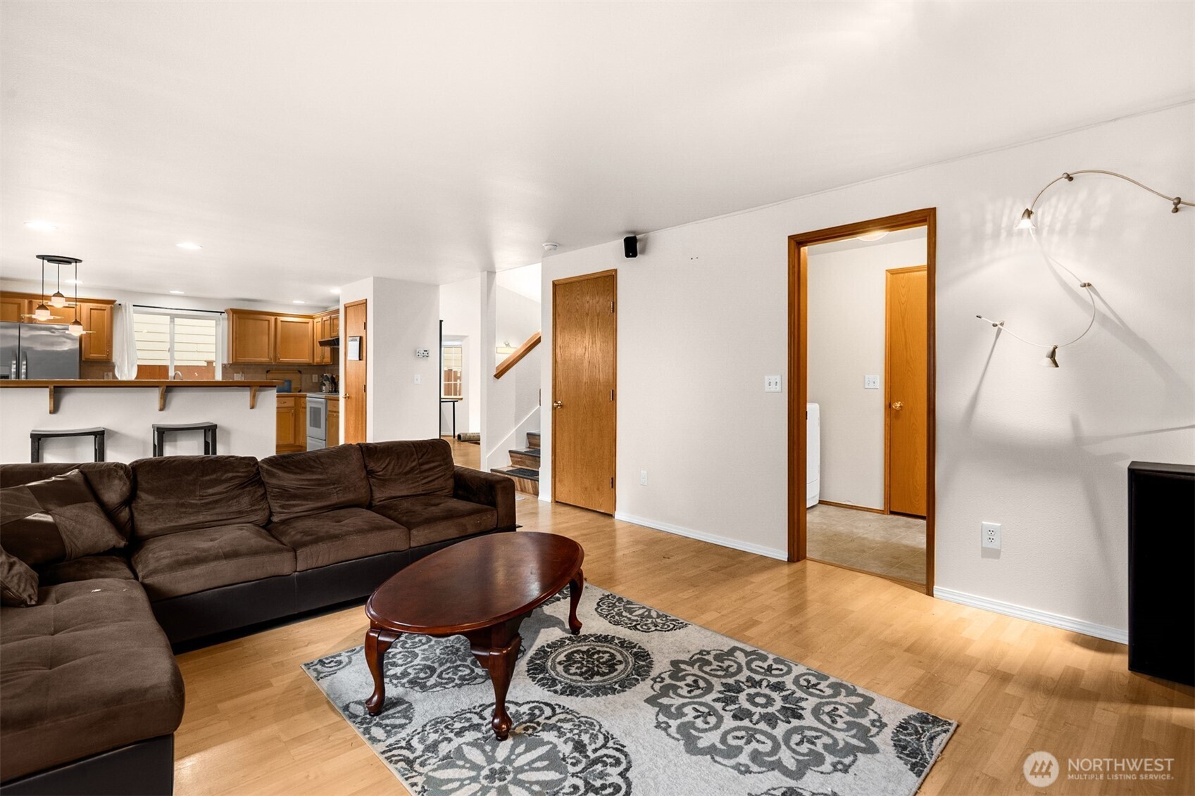 2632 Northeast 24th Court Renton, WA 98056 - Photo 20 of 33 a living room with furniture and a rug