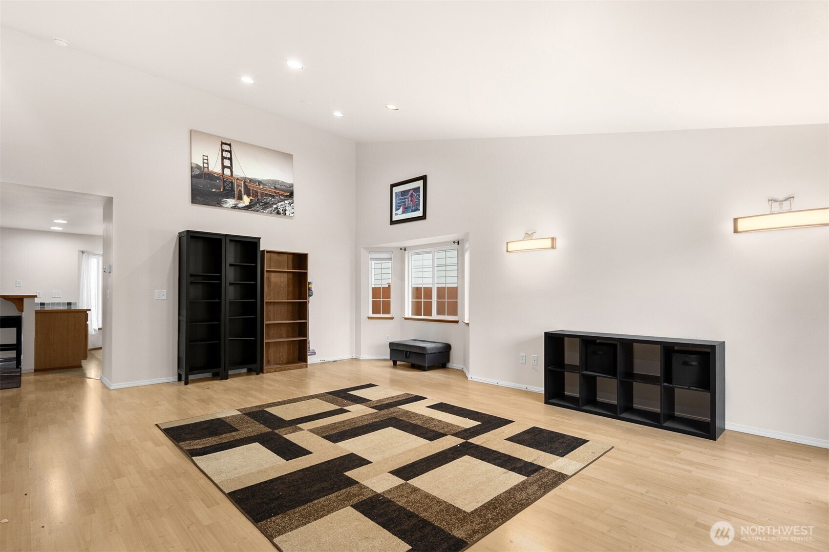 2632 Northeast 24th Court Renton, WA 98056 - Photo 2 of 33 a bedroom with furniture and a rug