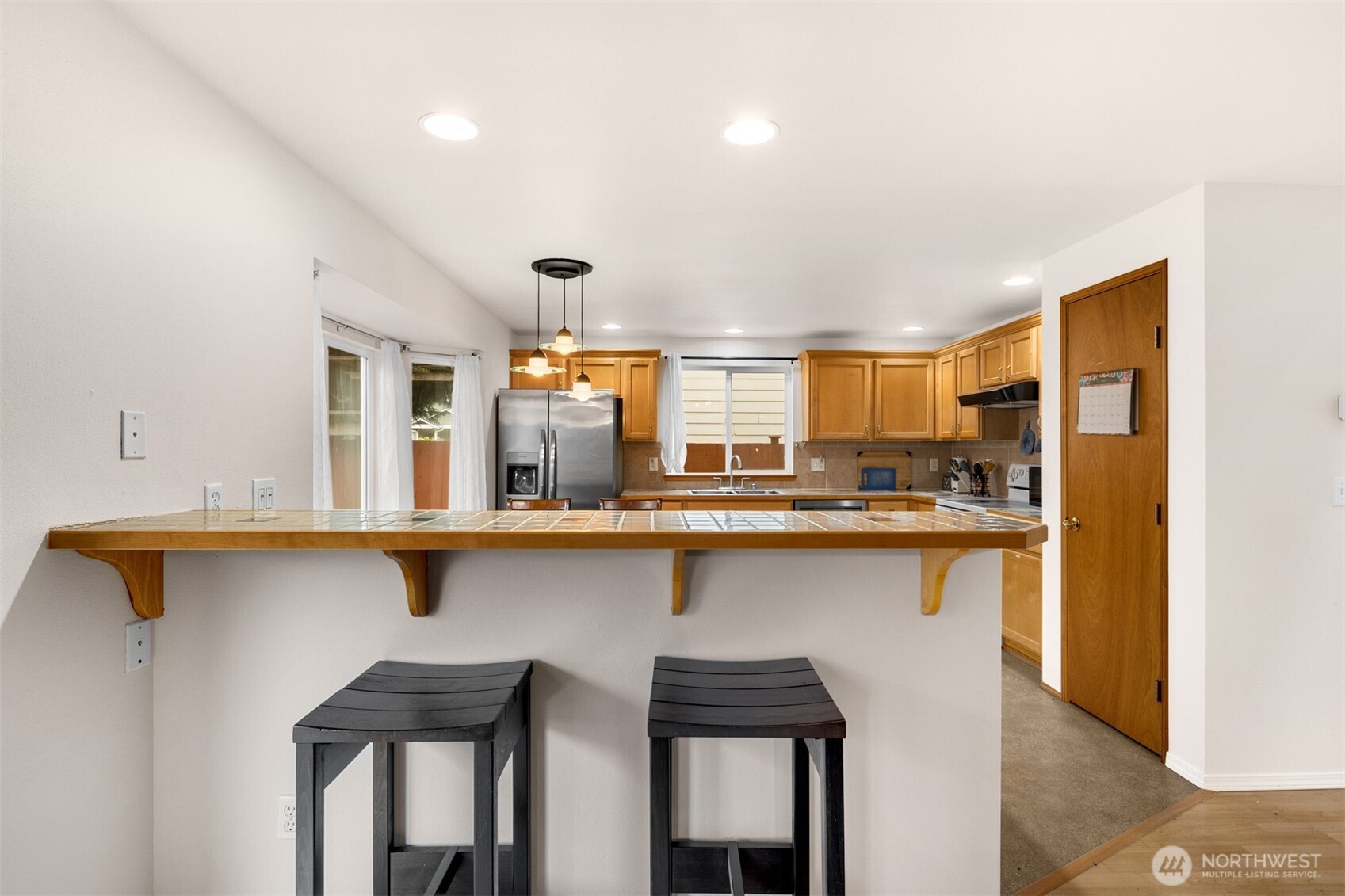 2632 Northeast 24th Court Renton, WA 98056 - Photo 21 of 33 a kitchen with a sink cabinets and window