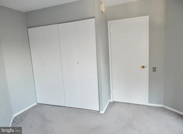 a bathroom with a toilet a sink and a shower